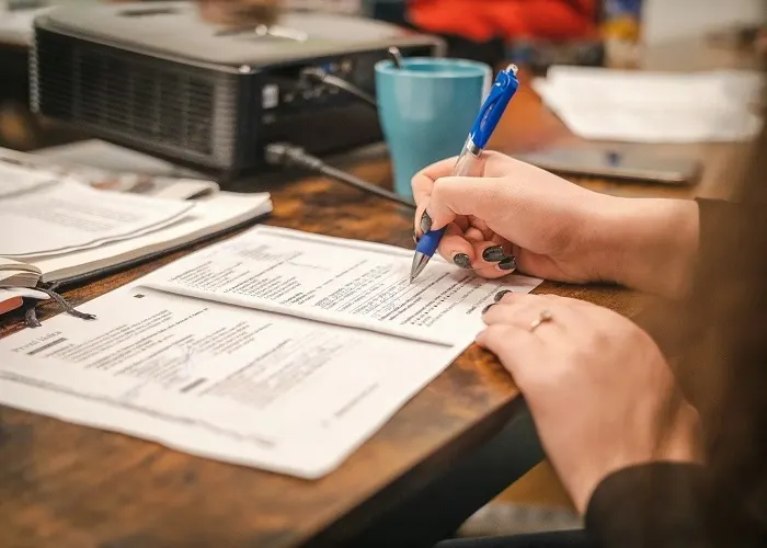Reviewer checking documents as evidence for recognition of prior learning