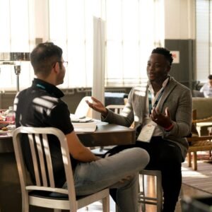 Level 1 Award in Mentoring: two adults discussing goals in a mentoring conversation